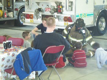 Firefighter showing how he searches inside houses