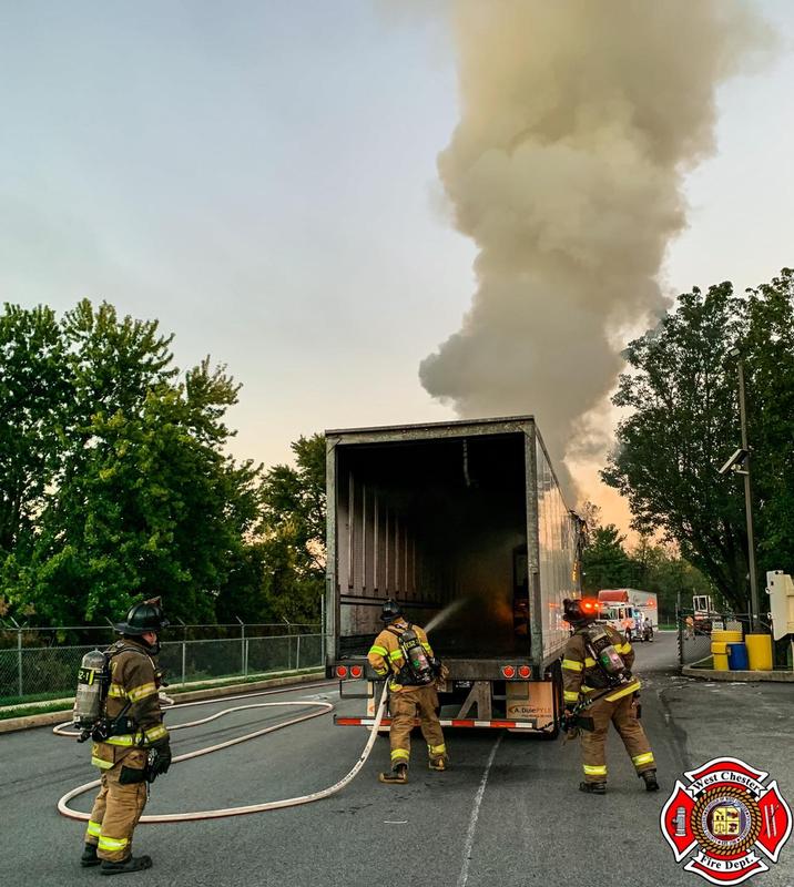 Engine 52-1 operating at a trailer fire